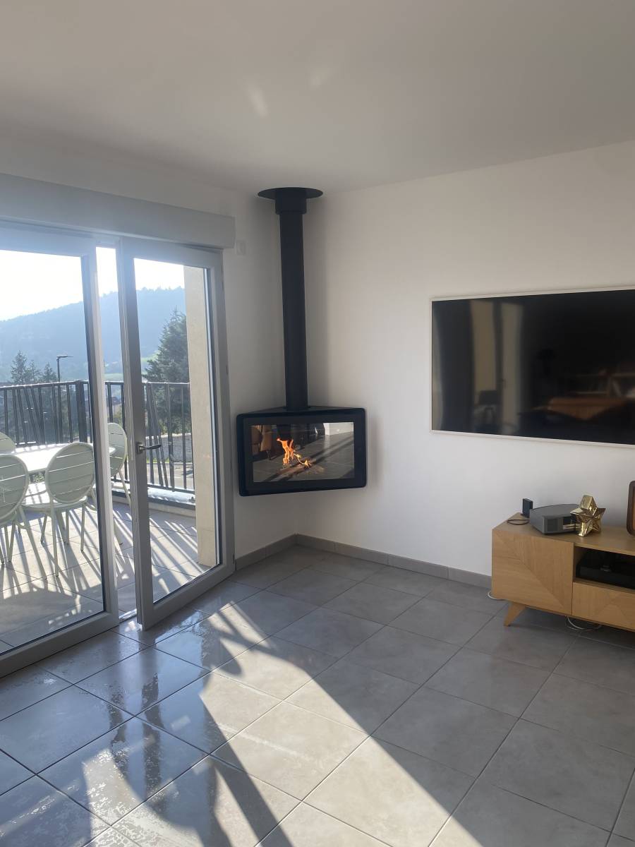 Installation d'un poêle suspendu Rocal à  Genay