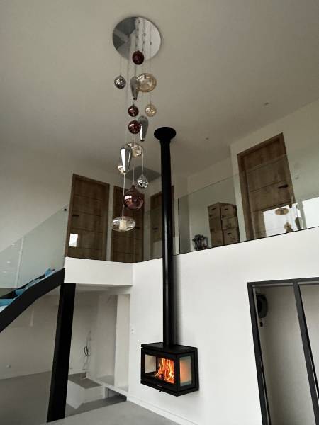 Installation d'un poêle à bois Rocal à Ecully